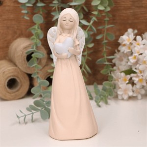 Aniołek dziewczynka z serduszkiem 19cm brzoskwiniowy 