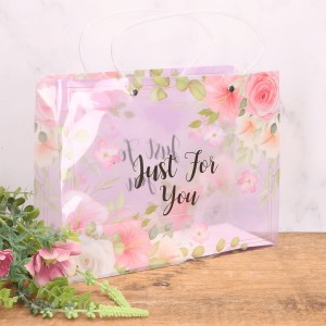 Torebka na kwiaty przezroczysta plastikowa róże i hibiskusy 27x21cm 