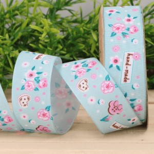 Wstążka kwiatki błękitna 2,5cm 9m